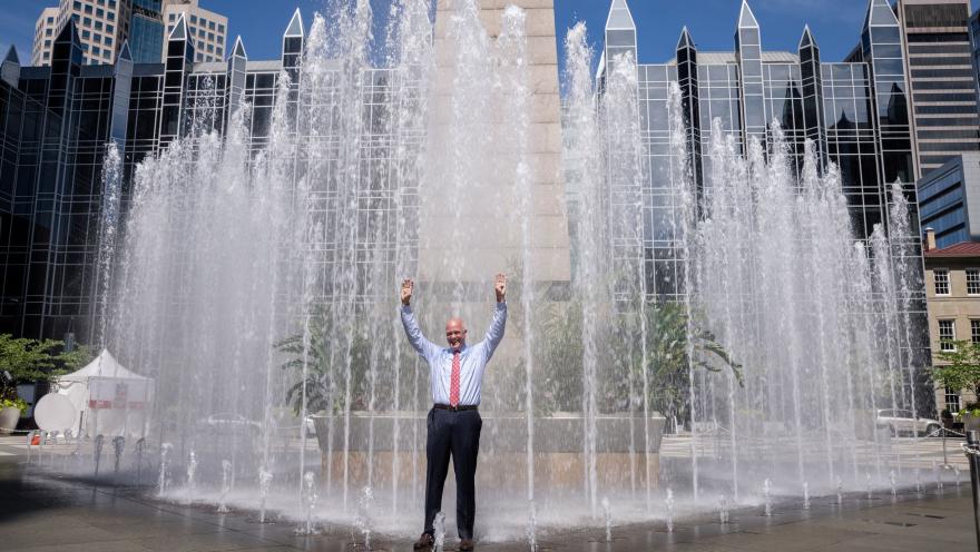 CEO Soakee Standing in Fountain